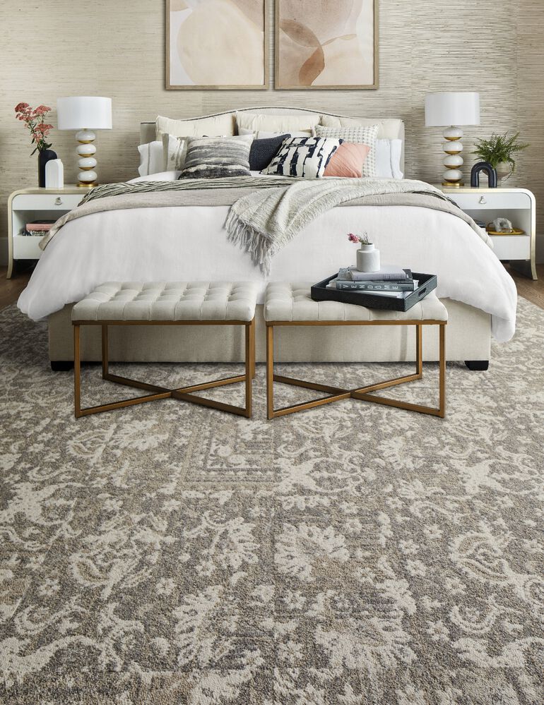 Bedroom with FLOR Fancy Free area rug shown in Stone